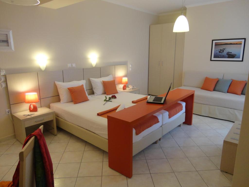 Postel nebo postele na pokoji v ubytování Al Mare Hotel