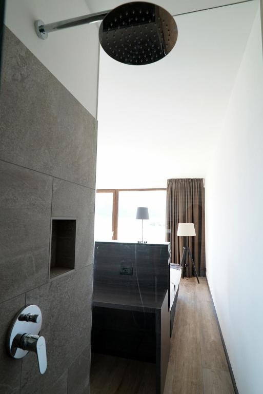 Postel nebo postele na pokoji v ubytování Hotel Raffl