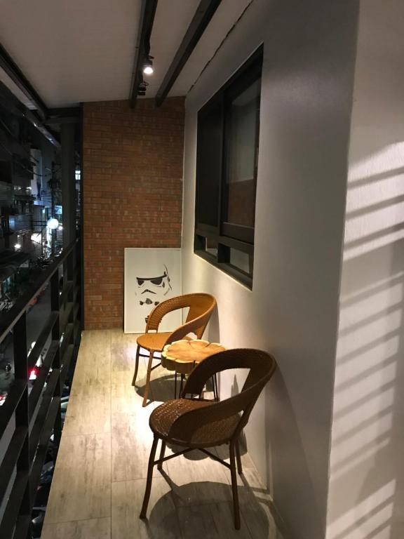 Posezení v ubytování Donghai Cottage Backpack Inn Suite