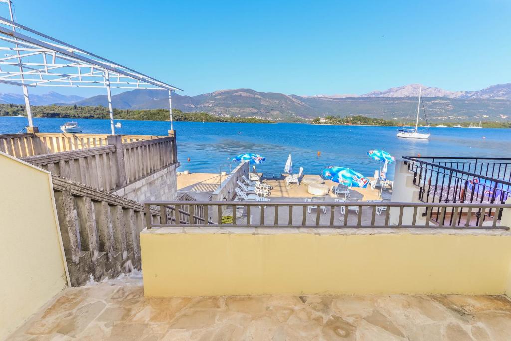 a balcony with a view of the water at Apartments Bella di Boka in Tivat