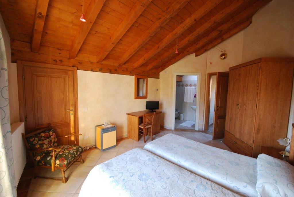 Postel nebo postele na pokoji v ubytování Garni Viggiona