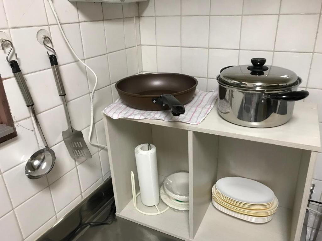 Kuchyň nebo kuchyňský kout v ubytování Shingu Guest House 奏
