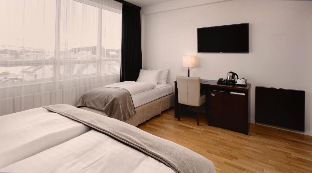 Postel nebo postele na pokoji v ubytování Hotel Kea by Keahotels