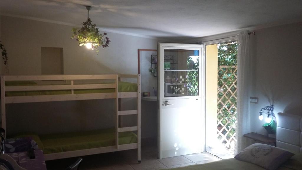 Postel nebo postele na pokoji v ubytování casa di campagna dal pozzo