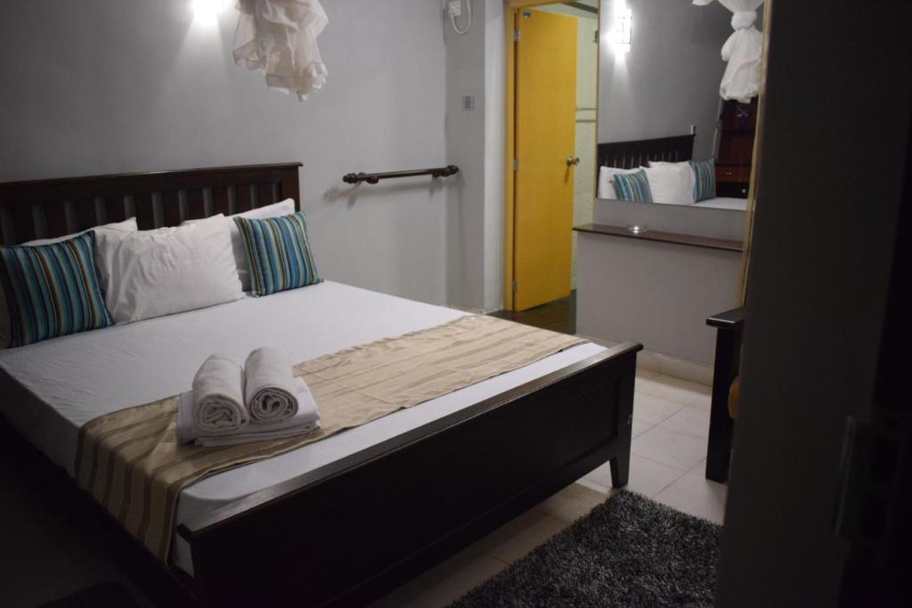 Postel nebo postele na pokoji v ubytování Grand Resort