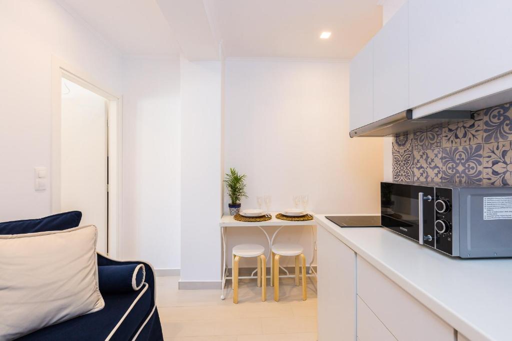 Kuchnia lub aneks kuchenny w obiekcie Georgioupolis Plaza Suites