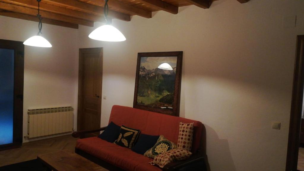 A seating area at Refugio La Covatilla I,II,III y IV