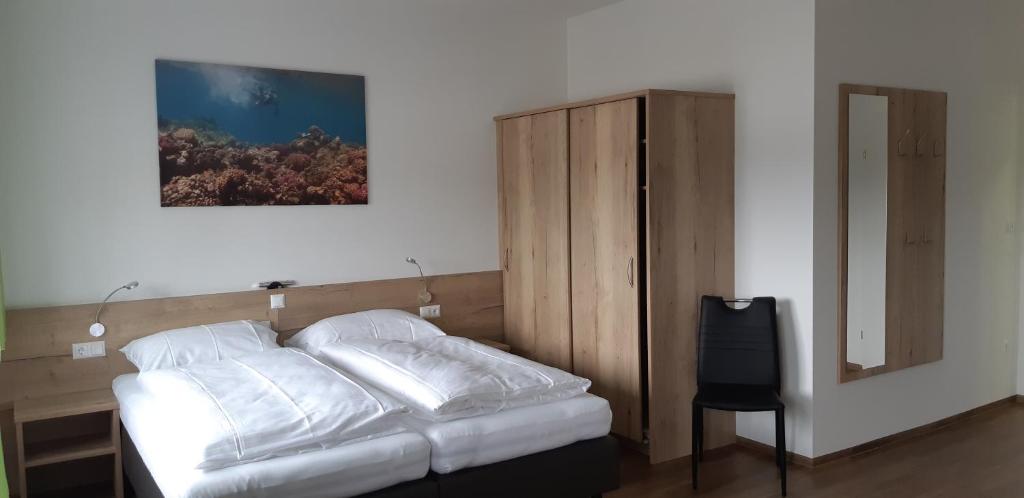 Posteľ alebo postele v izbe v ubytovaní Hotel Rimo