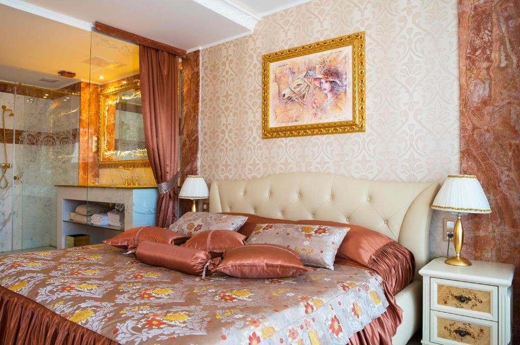 Postel nebo postele na pokoji v ubytování Grand Hotel Donat Superior & Wellness Center