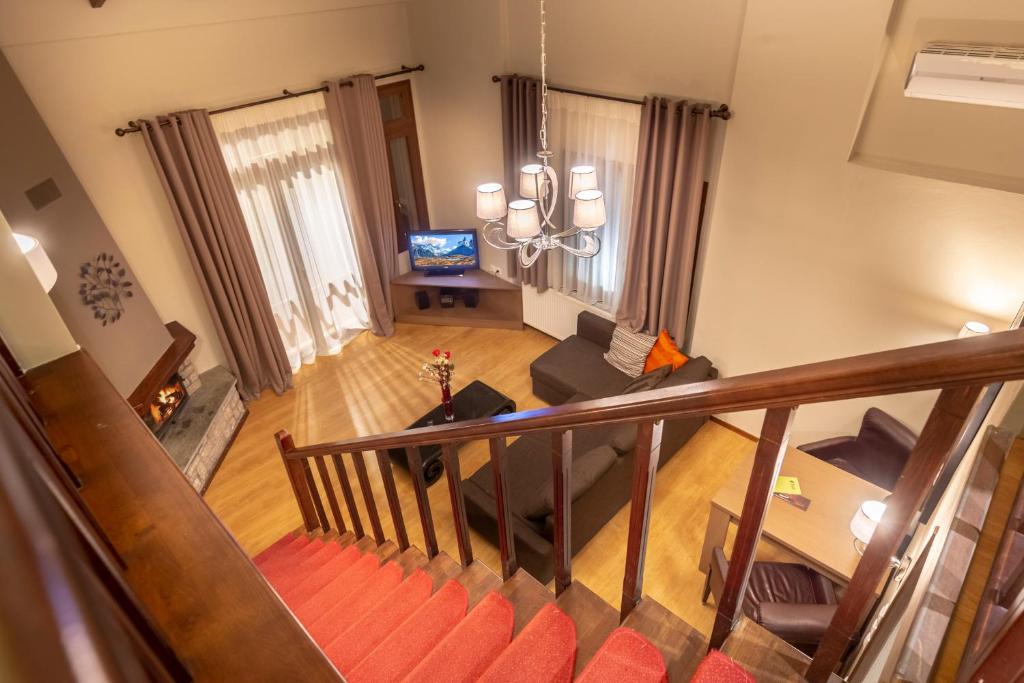TV a/nebo společenská místnost v ubytování Nevros Hotel Resort and Spa