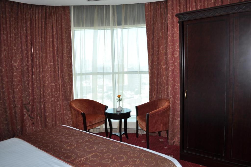 Postel nebo postele na pokoji v ubytování Musherib Hotel