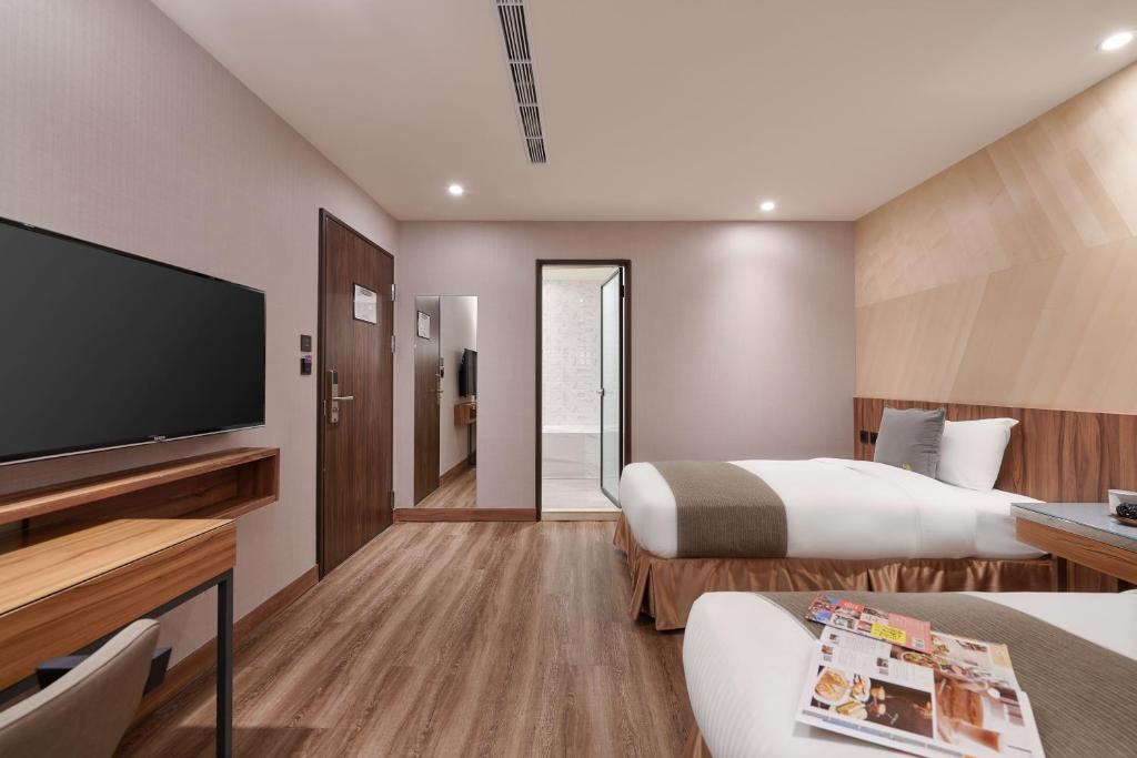 TV a/nebo společenská místnost v ubytování Muzik Hotel - Ximending Xining Branch