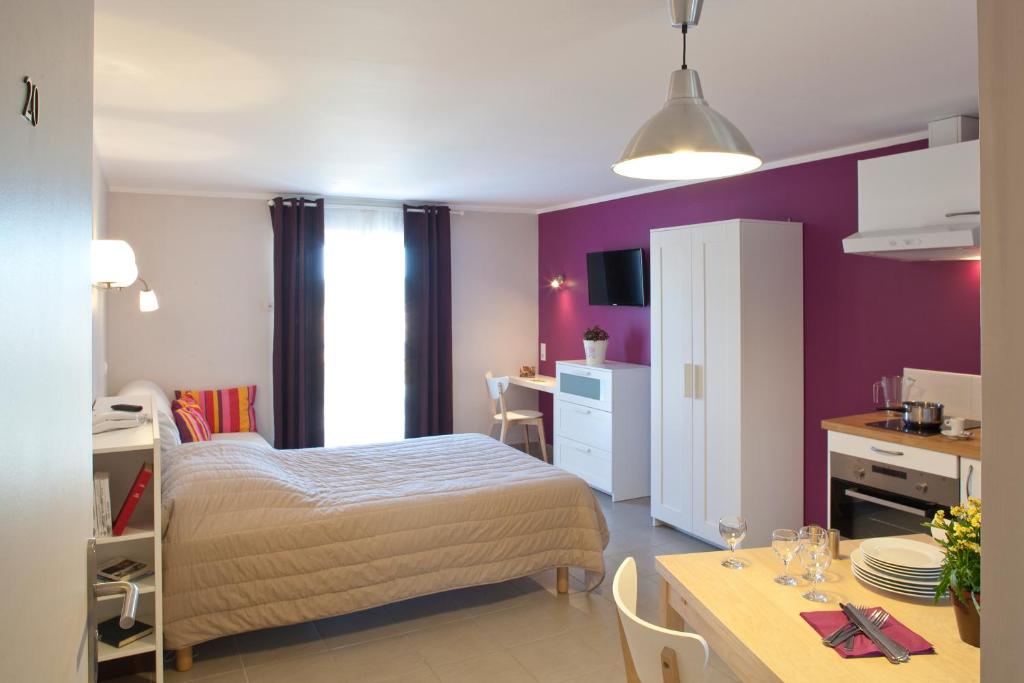 Kuchyň nebo kuchyňský kout v ubytování hotel des Sapins