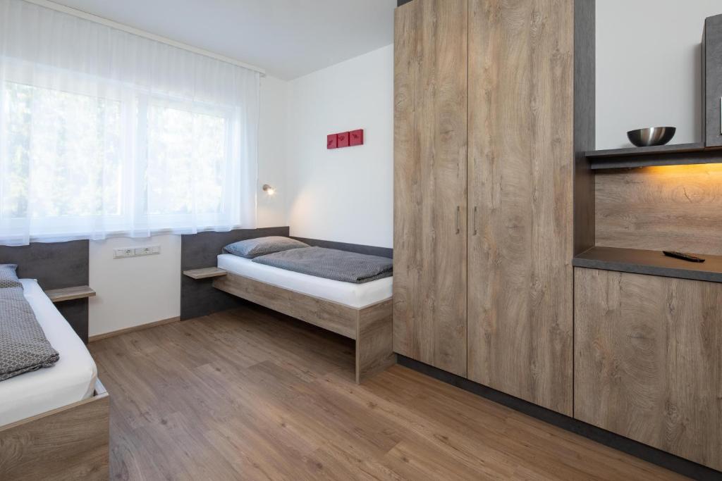 Postel nebo postele na pokoji v ubytování Haus adK
