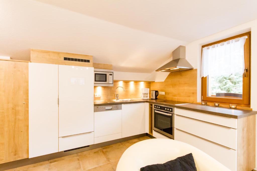 Kuchyň nebo kuchyňský kout v ubytování Haus Waltraud