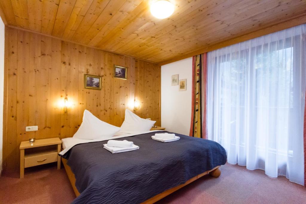 Postel nebo postele na pokoji v ubytování Haus Waltraud