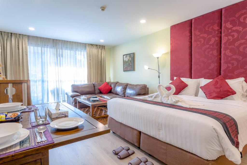 Postel nebo postele na pokoji v ubytování Citismart Luxury Apartments