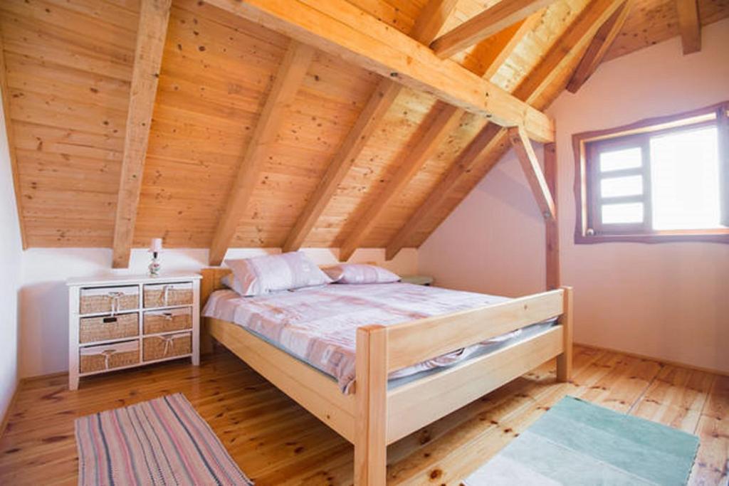 Posteľ alebo postele v izbe v ubytovaní Peacefull family cottage