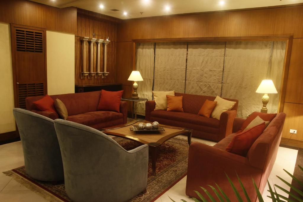 Posezení v ubytování Herald Suites Solana