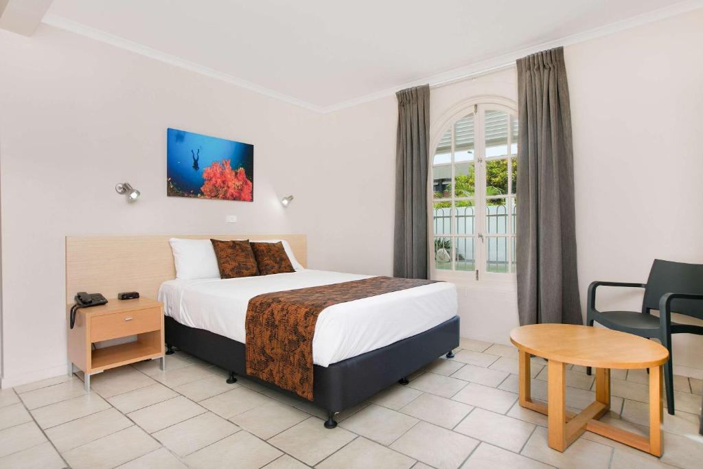 Postel nebo postele na pokoji v ubytování Comfort Inn Cairns City