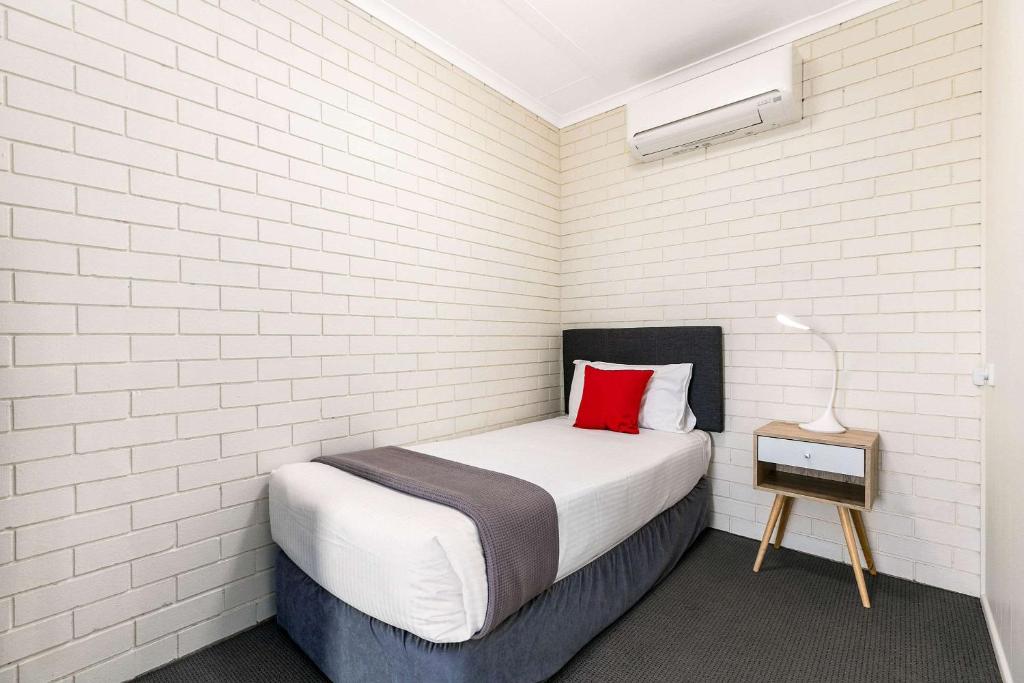 Postel nebo postele na pokoji v ubytování Comfort Inn on Main Hervey Bay