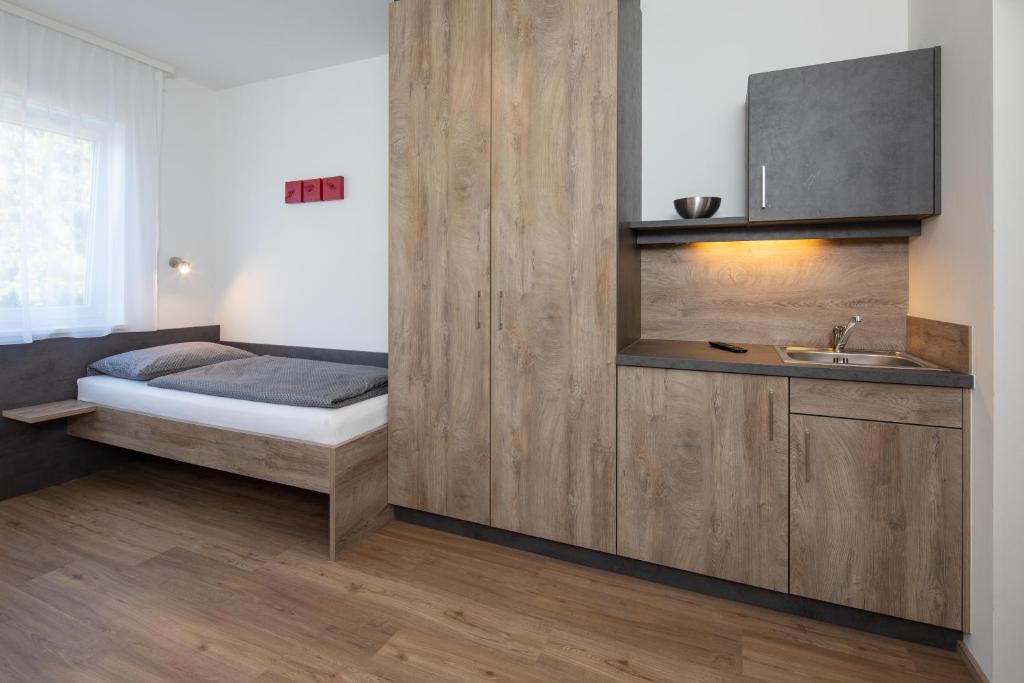 Postel nebo postele na pokoji v ubytování Haus adK