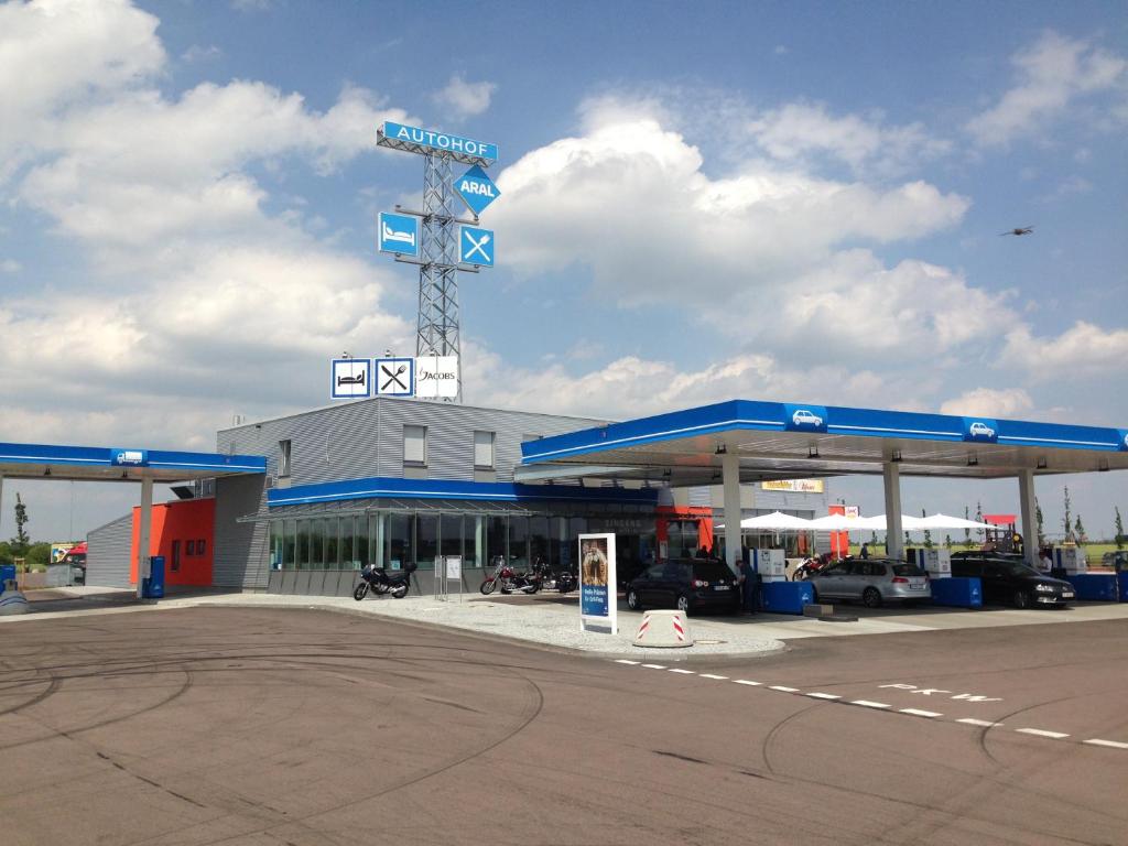 a gas station with a sign on top of it at Autohof Bitterfeld in Bitterfeld