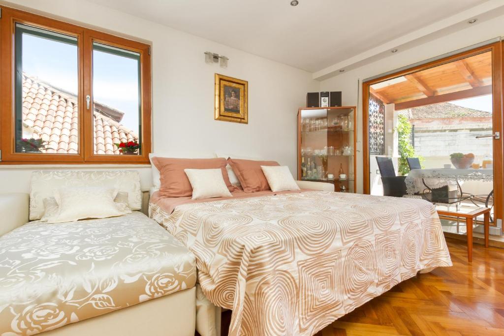 Posteľ alebo postele v izbe v ubytovaní Penthouse Matkovic