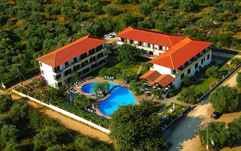 an aerial view of a resort with a swimming pool at Natasa Hotel in Skala Potamias