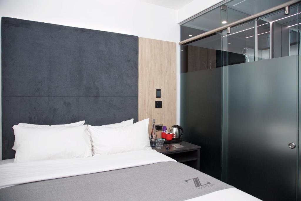 Postel nebo postele na pokoji v ubytování The Z Hotel Bath