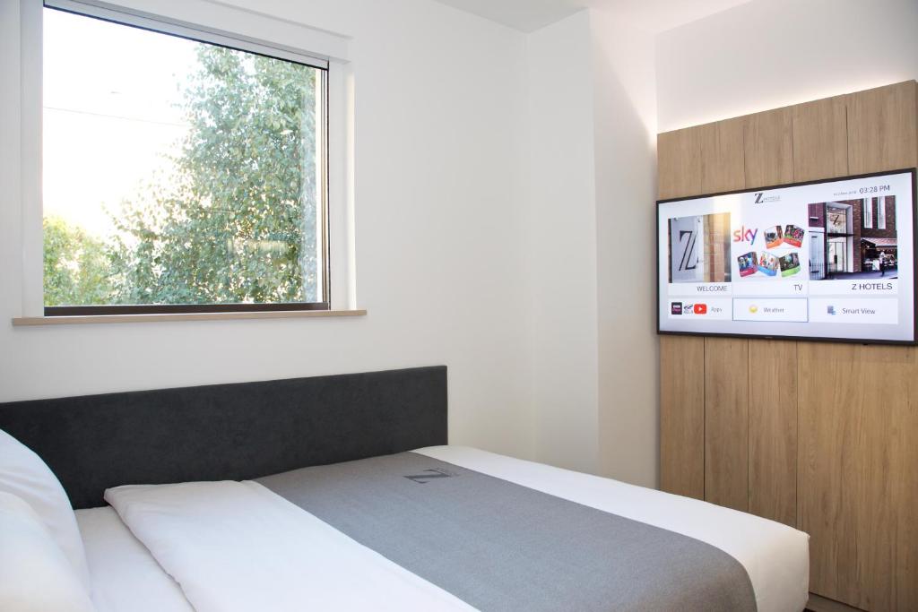 Postel nebo postele na pokoji v ubytování The Z Hotel Bath