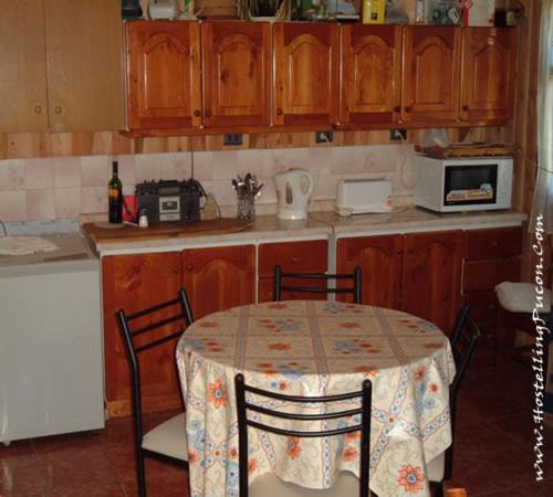 Kuchyň nebo kuchyňský kout v ubytování Hostal Emalafquen