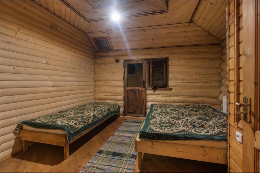 Postel nebo postele na pokoji v ubytování Kotedzh Smereka