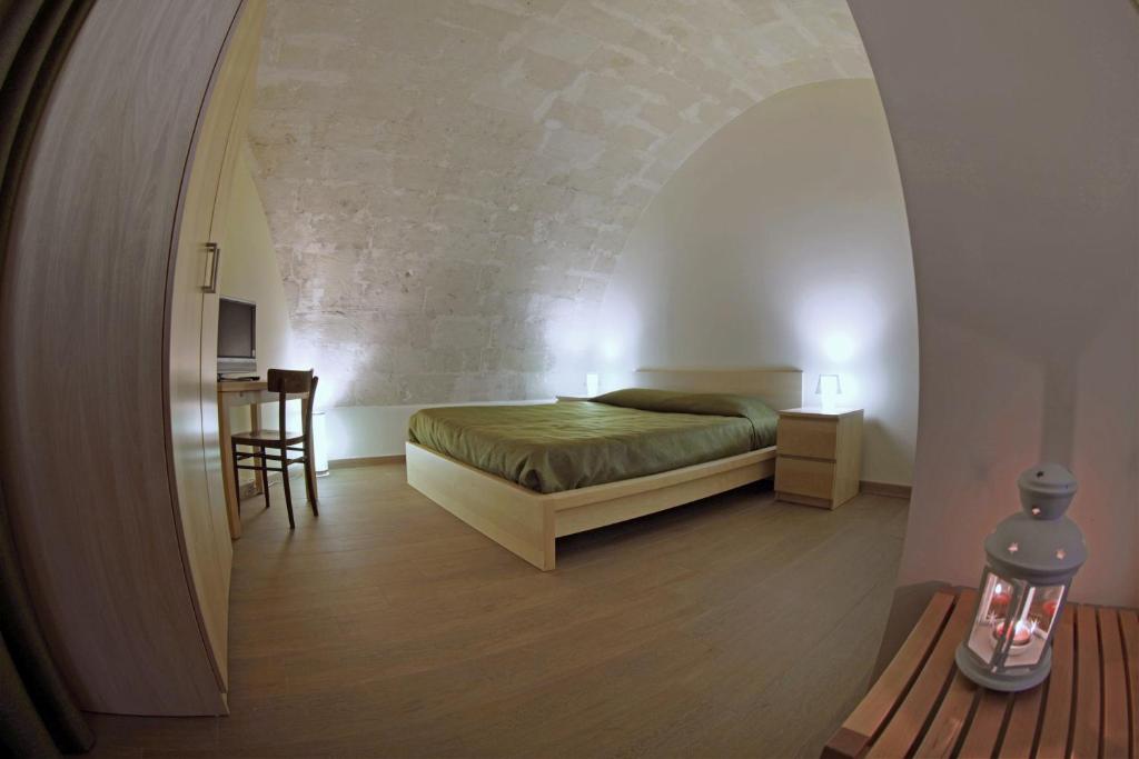 Postel nebo postele na pokoji v ubytování Casa Natalì