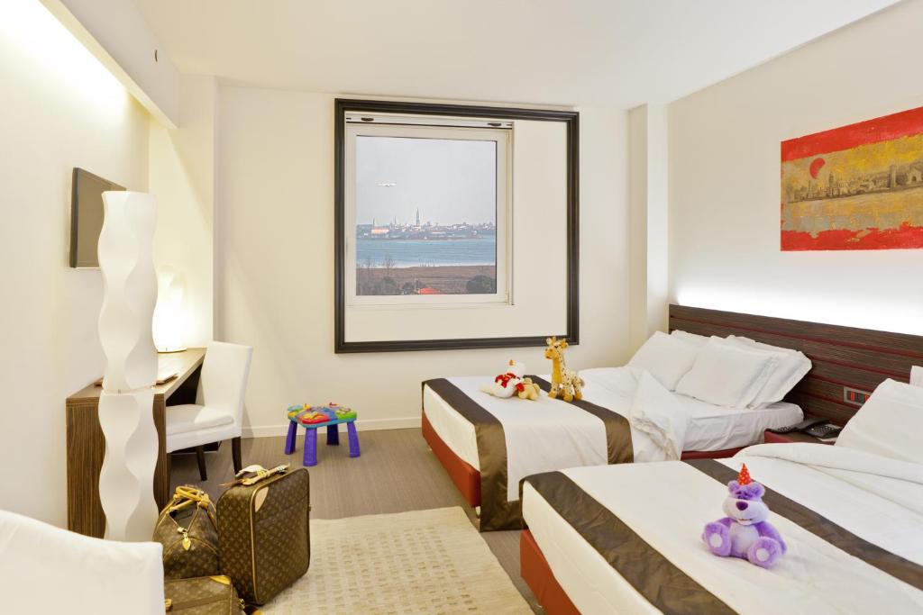 Postel nebo postele na pokoji v ubytování Antony Hotel - Venice Airport