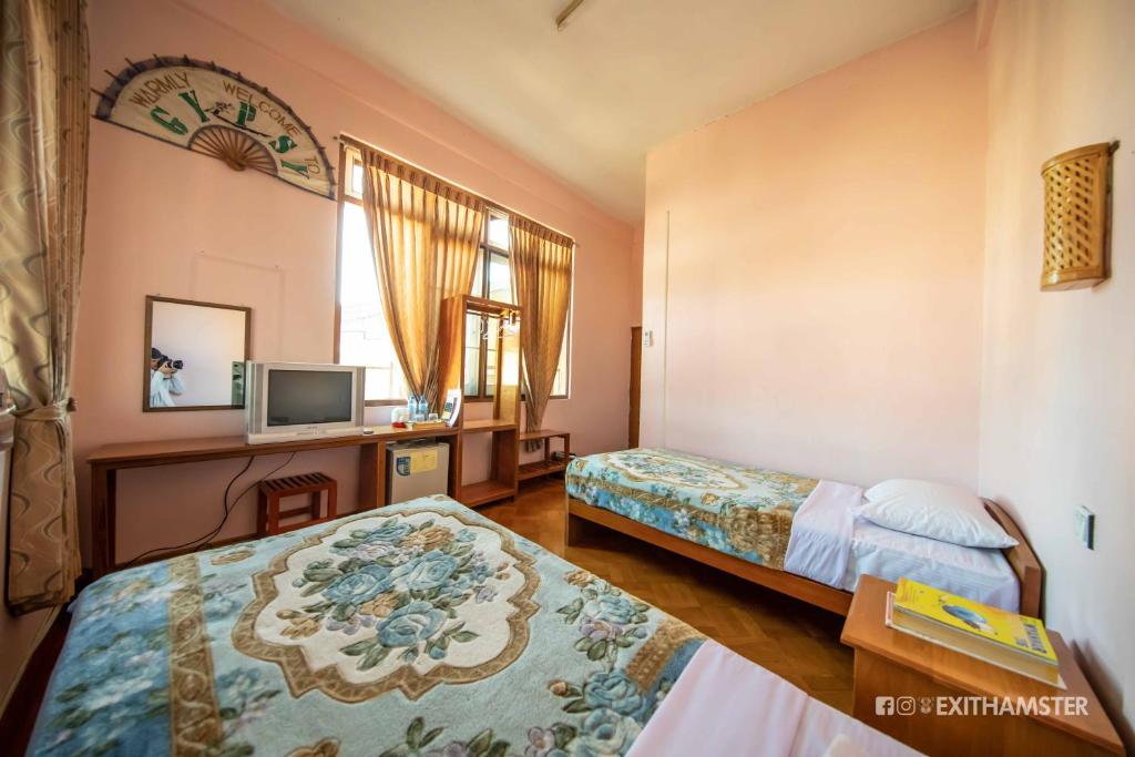 Postel nebo postele na pokoji v ubytování Gypsy Inn