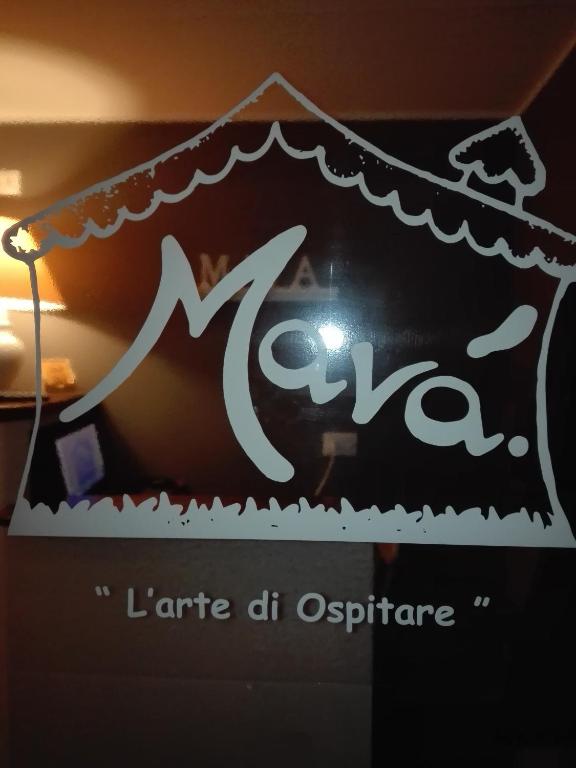 a sign for aarmaarmaarmaarma dharmaarmaarmaarmaarmaarmaarma at Mavà in Catania