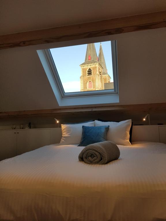 Postel nebo postele na pokoji v ubytování Homey - Kortrijk
