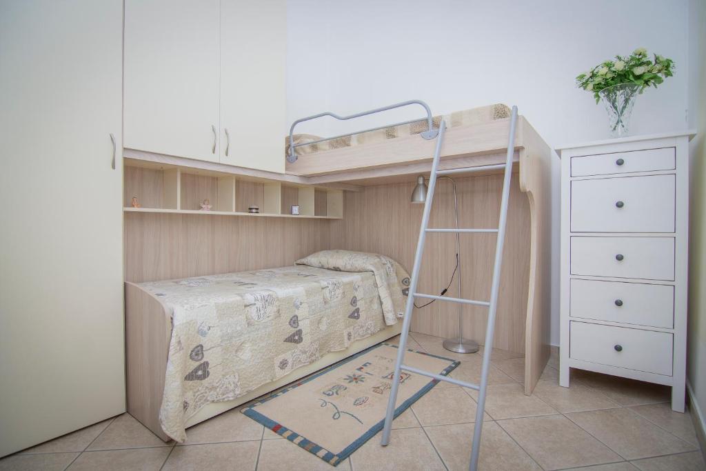 A bed or beds in a room at Casa Ester