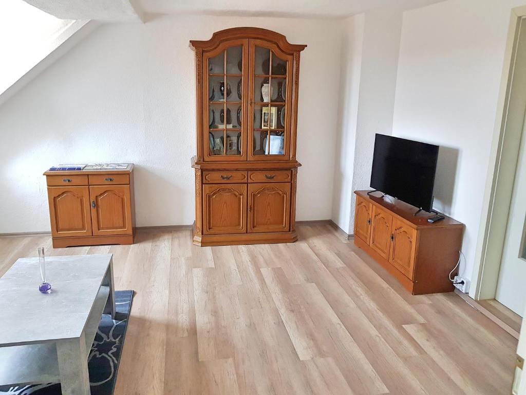 TV a/nebo společenská místnost v ubytování Ferienwohnung "Alte Fleischerei" Freiberg Sachsen