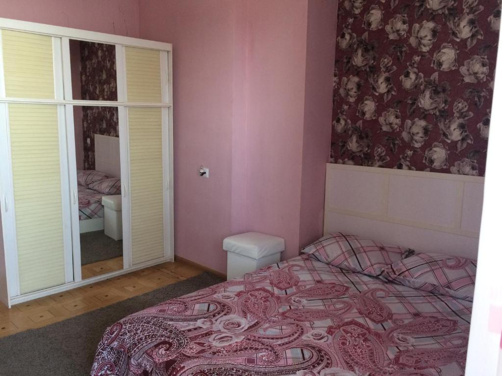 Postel nebo postele na pokoji v ubytování Guest House Lilia