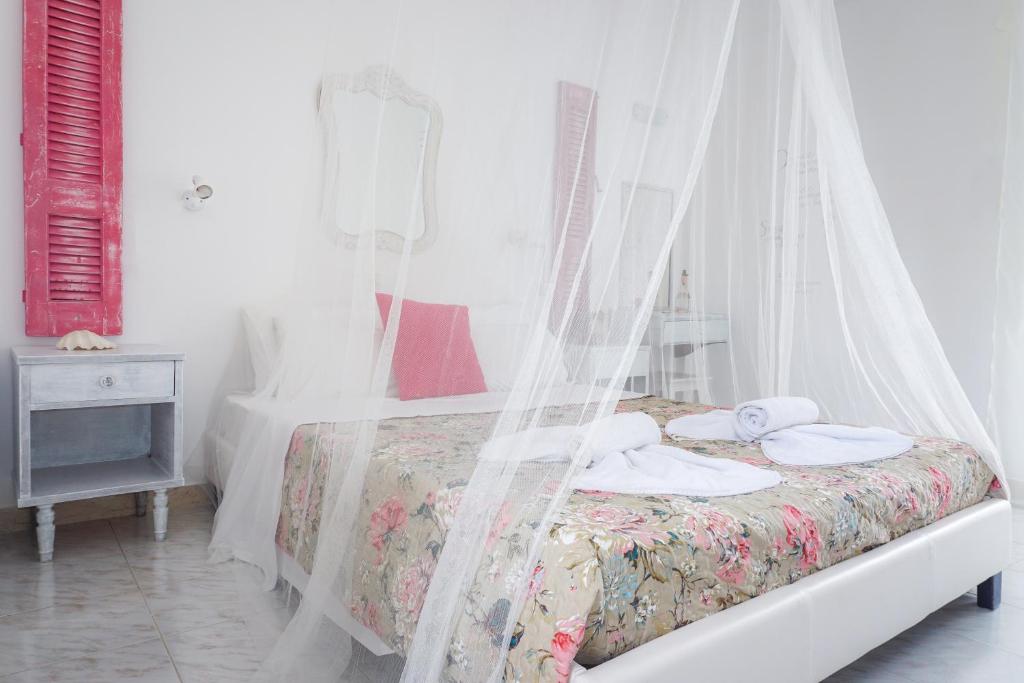 Postel nebo postele na pokoji v ubytování Cubaneros Holiday Inn