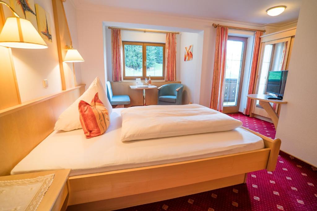 Postel nebo postele na pokoji v ubytování Haus Markus