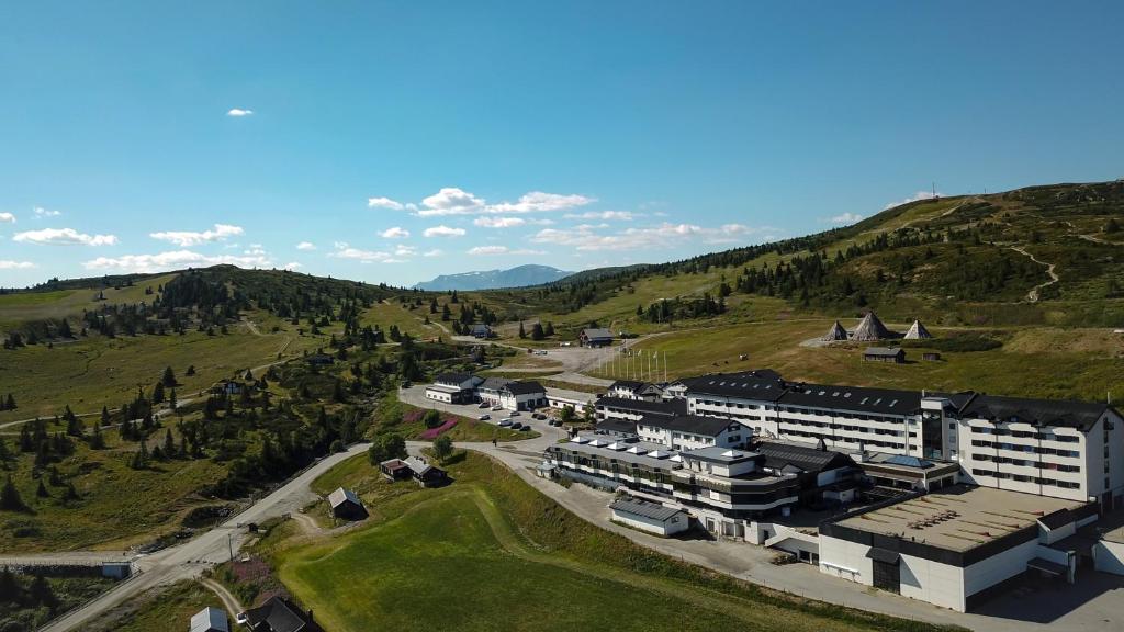 an aerial view of a building in the mountains at Storefjell Resort Hotel in Gol