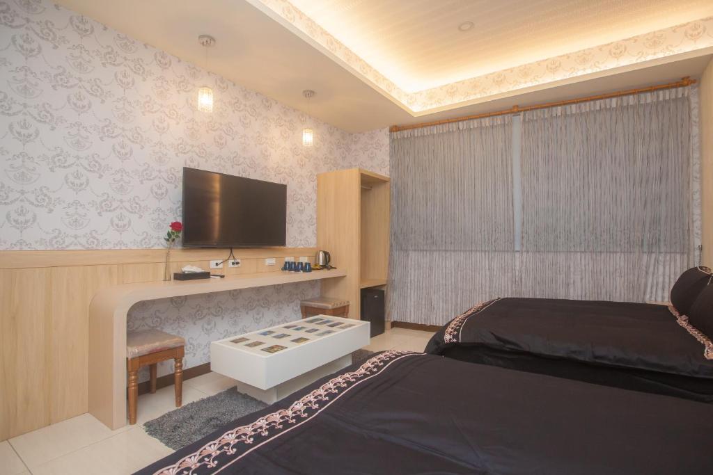 TV a/nebo společenská místnost v ubytování Waterfront Guesthouse