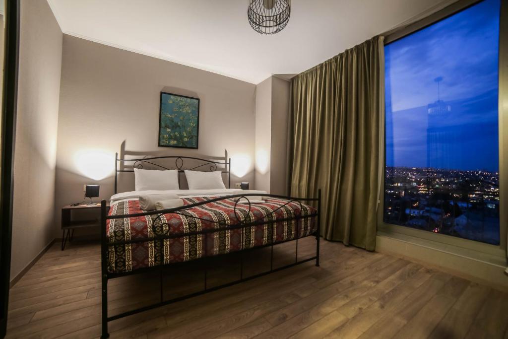 Postel nebo postele na pokoji v ubytování Hotel Flower