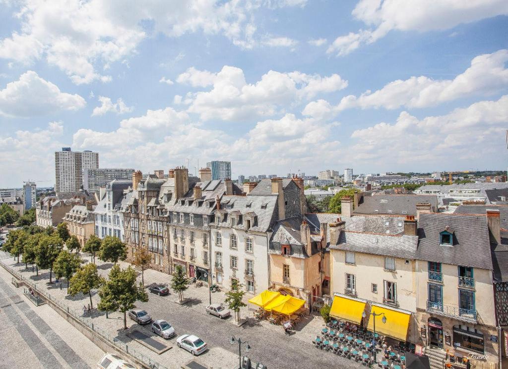an aerial view of a city with buildings at Hotel Des Lices in Rennes