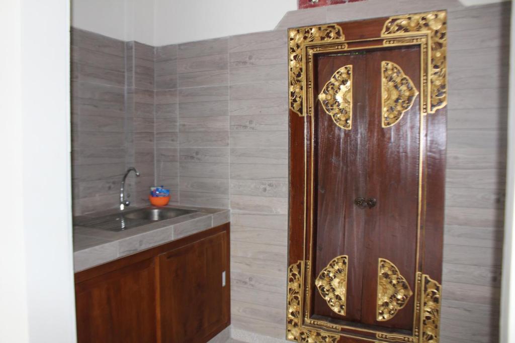 Koupelna v ubytování Balimas Guest House