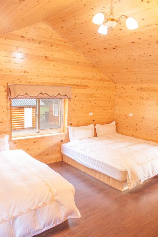 Postel nebo postele na pokoji v ubytování Xitou Star Homestay