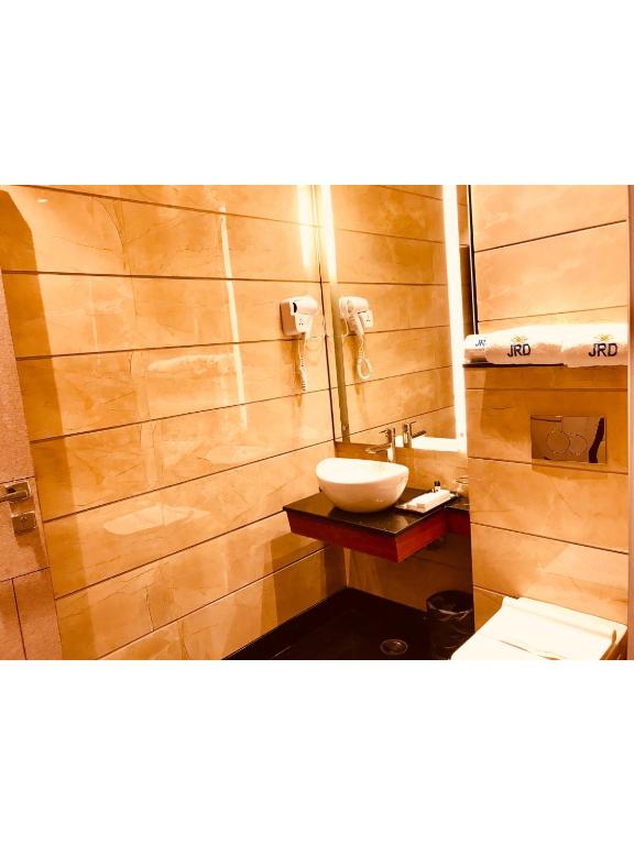 Koupelna v ubytování JRD Pride-Business Hotel
